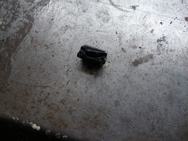 Ausgebauter Gummianschlag